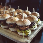 A sandwich sitting on top of a wooden table