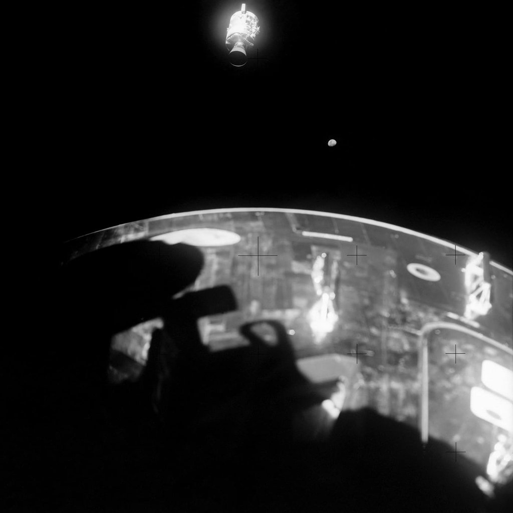 The damaged Service Module of Apollo 13 detaching from the Lunar Module.