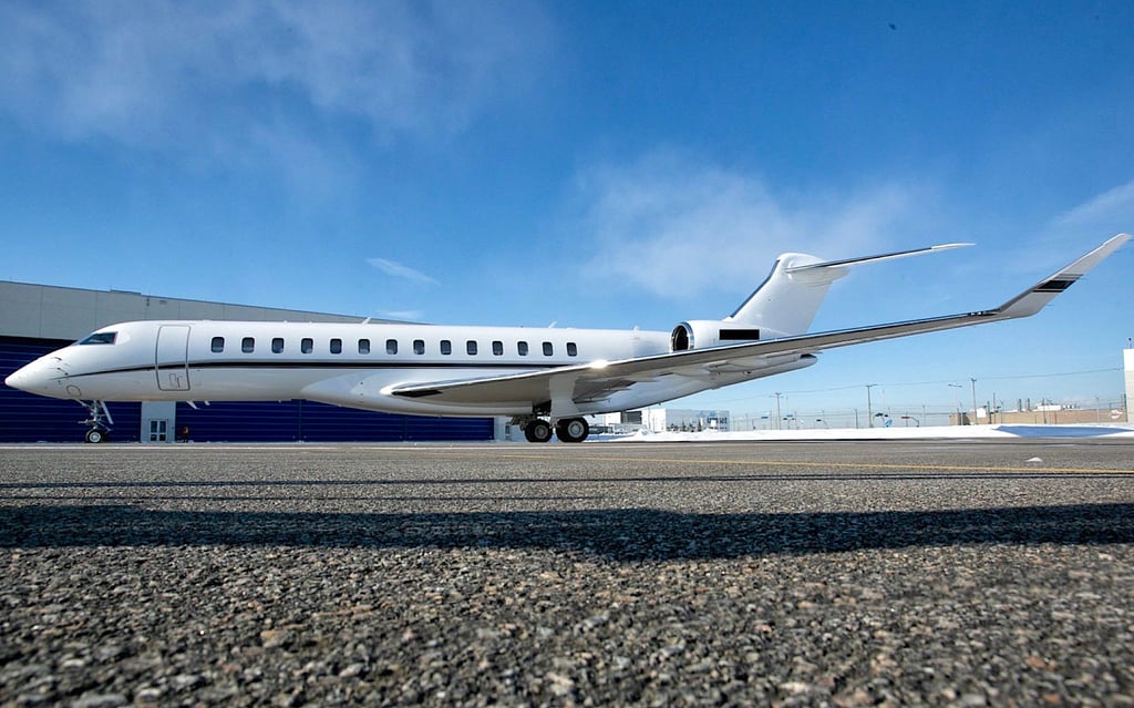 A large passenger jet sitting on top of a runway