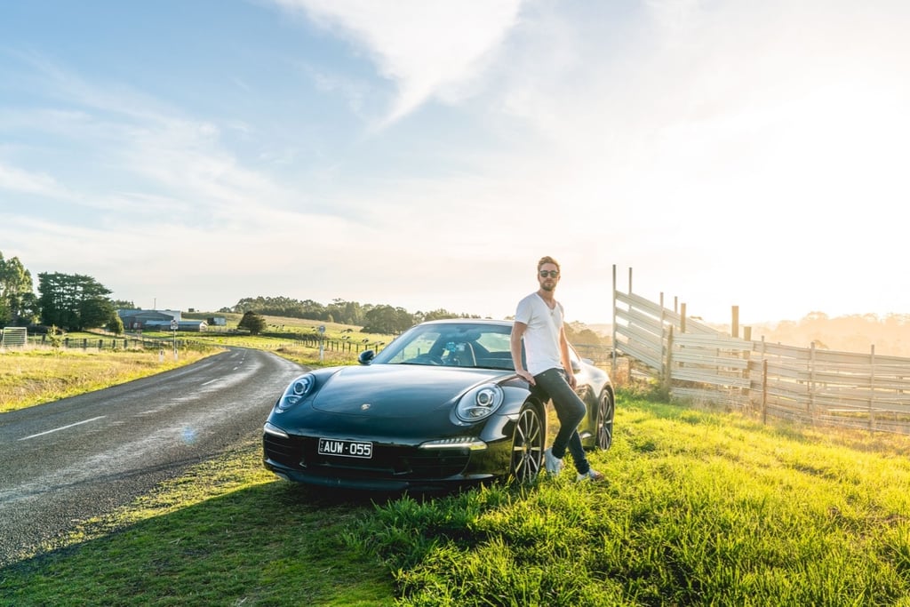 A car parked in a grassy field