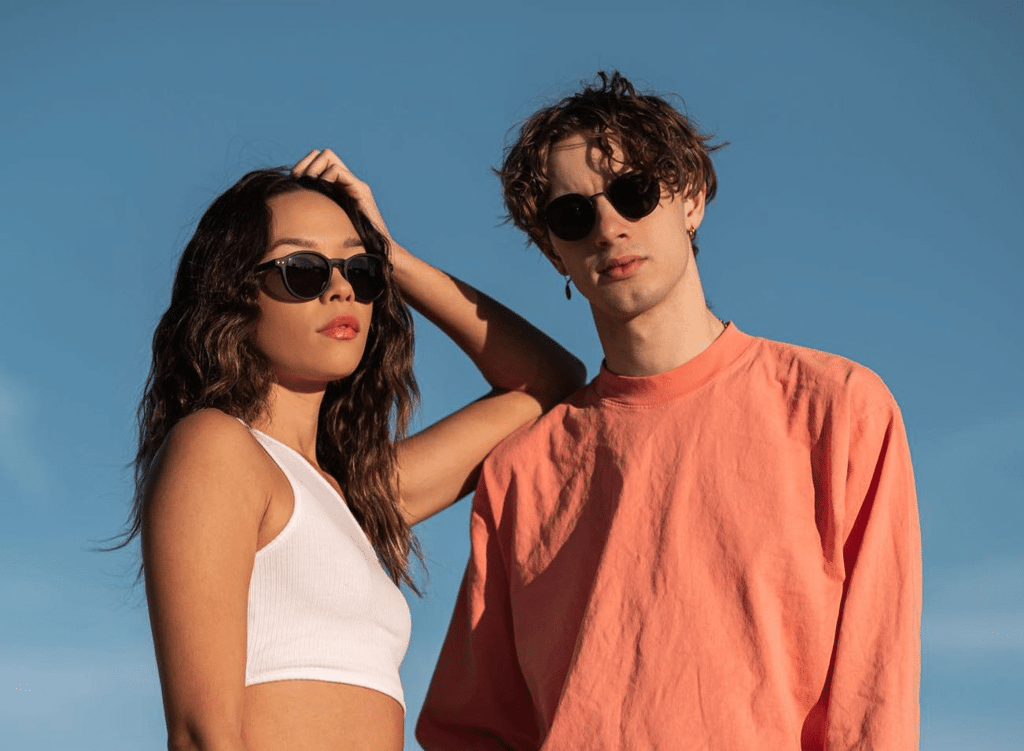 A woman wearing sunglasses posing for the camera