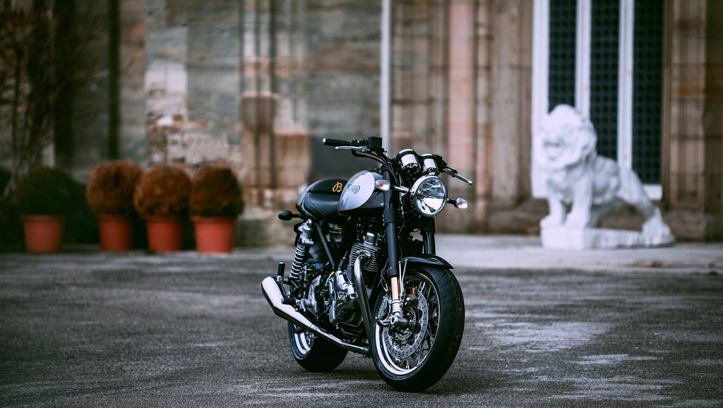 A motorcycle parked on the side of a road