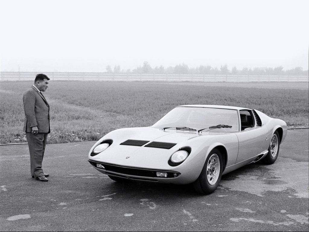 Ferruccio Lamborghini staring at a Miura in 1966