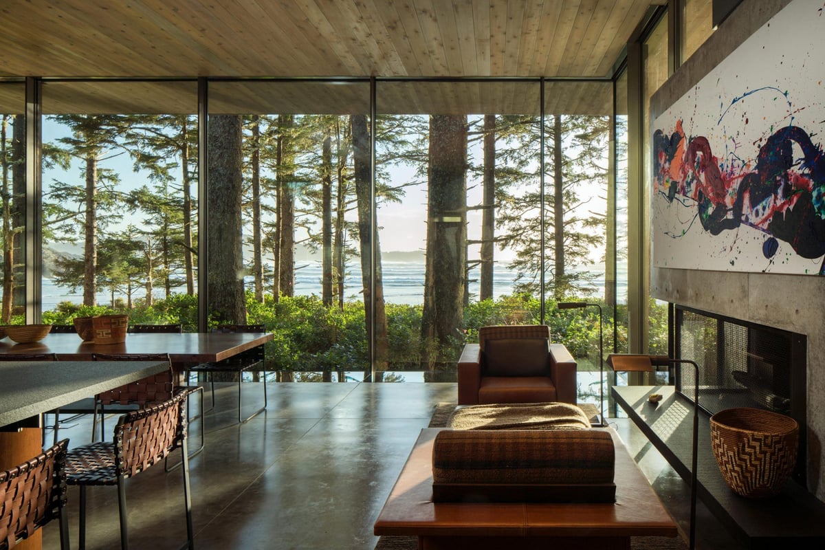 A living room filled with furniture and a large window