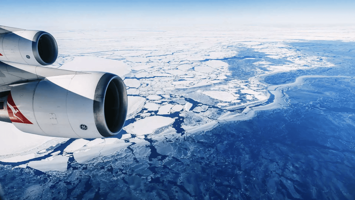 A airplane that is covered in snow