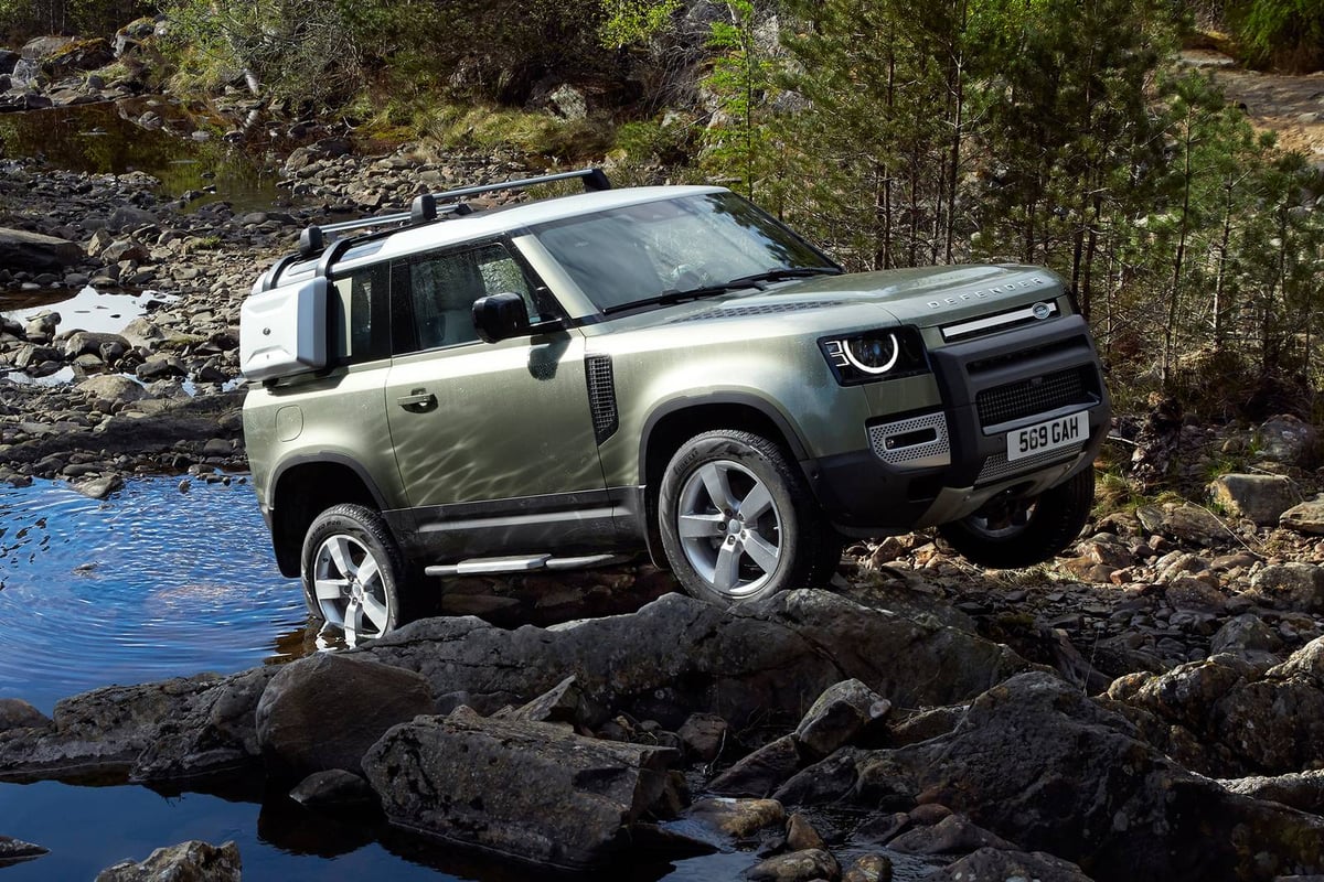 A car parked on the side of a rock