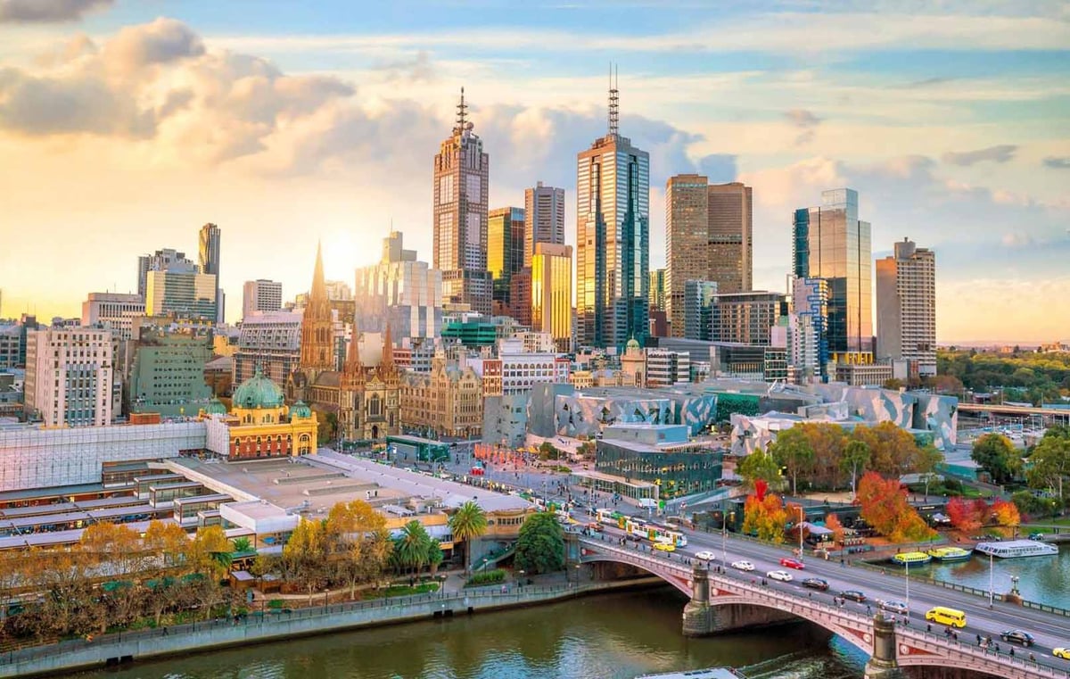 A river with a city in the background