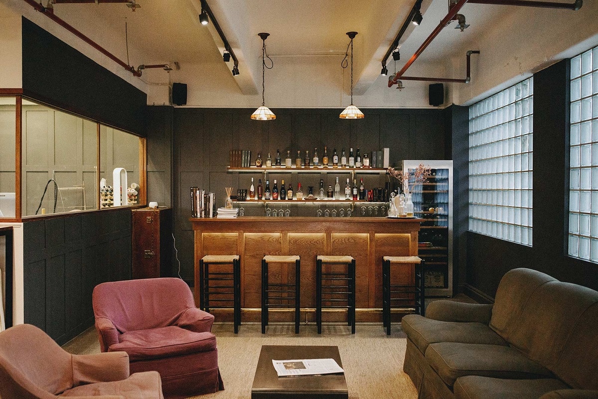 A living room filled with furniture and a fireplace