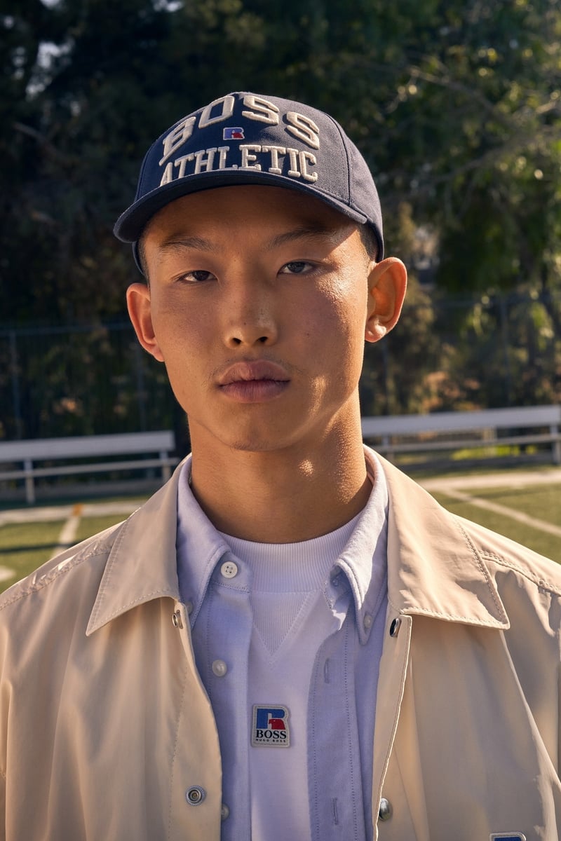 Boss x Russell Athletic modelled with cap and overshirt