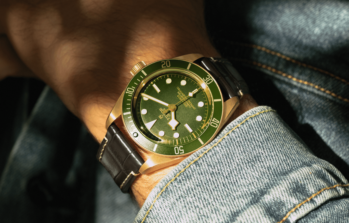 A close up of a watch on a persons hand