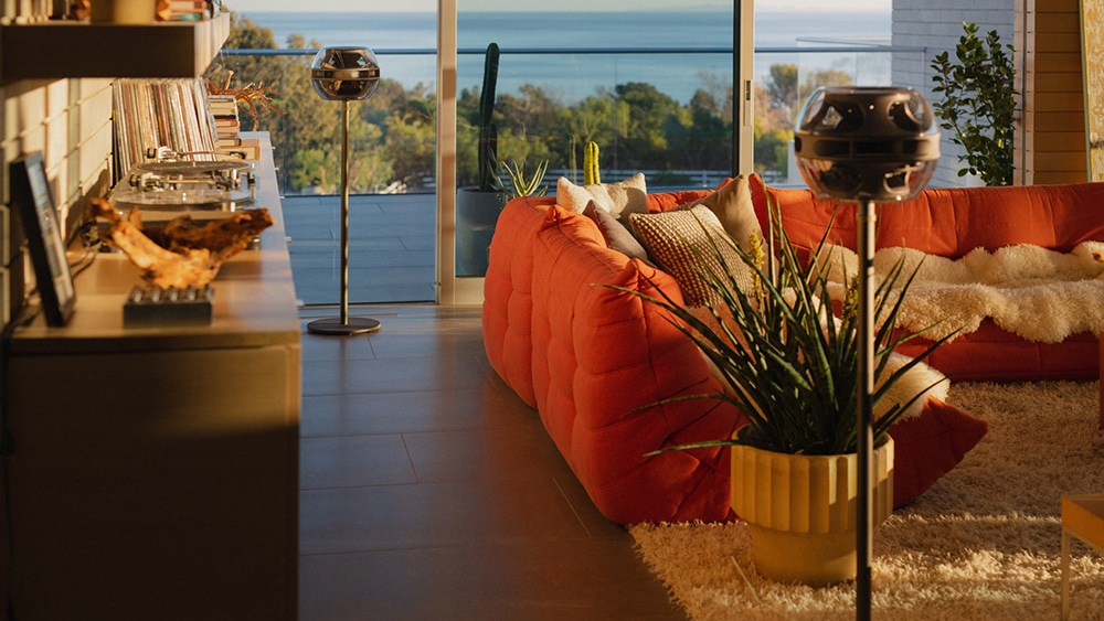 Two Cell Alpha speaker units set up in a lounge room.