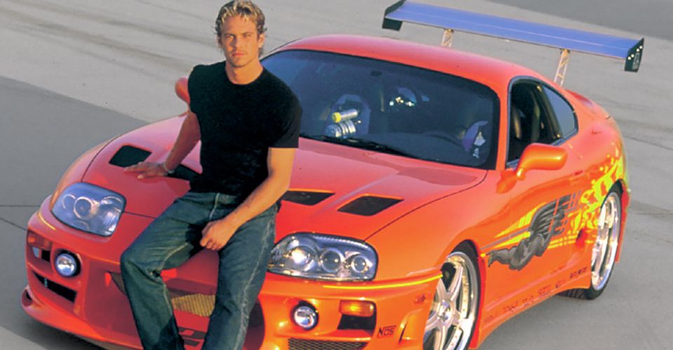 Paul Walker in front of the 1994 Supra