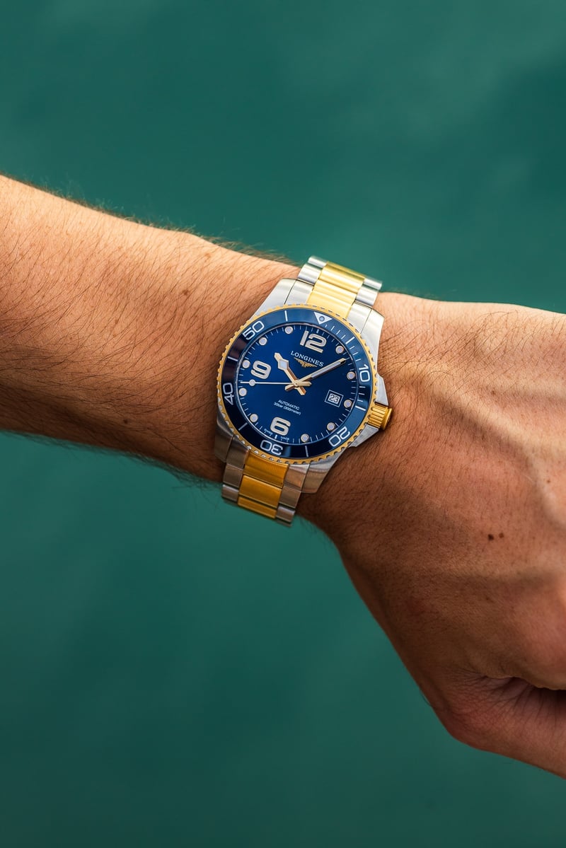 Longines conquest two tone cheap