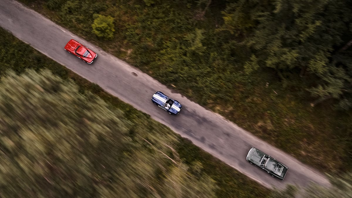 29 Three icons of the American car culture Chevrolet Corvette Shelby Cobra Ford Mustang from left to right RGB