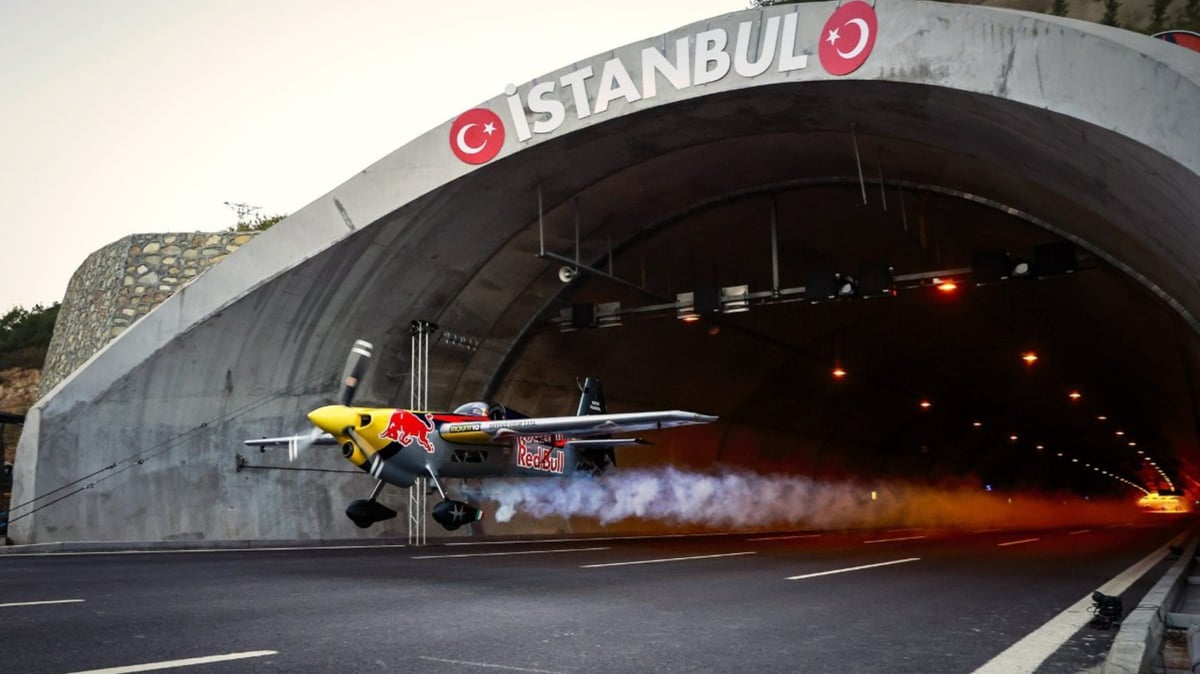 WATCH: Red Bull Stunt Pilot Flies Plane Through A Tunnel