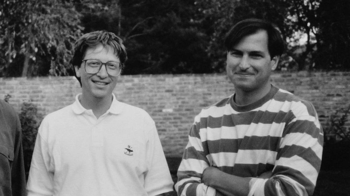 A couple of guys posing for a photo