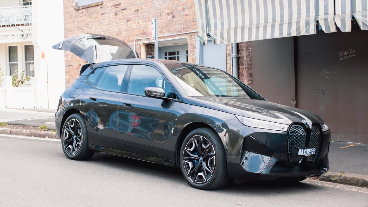 A car parked on the side of a building