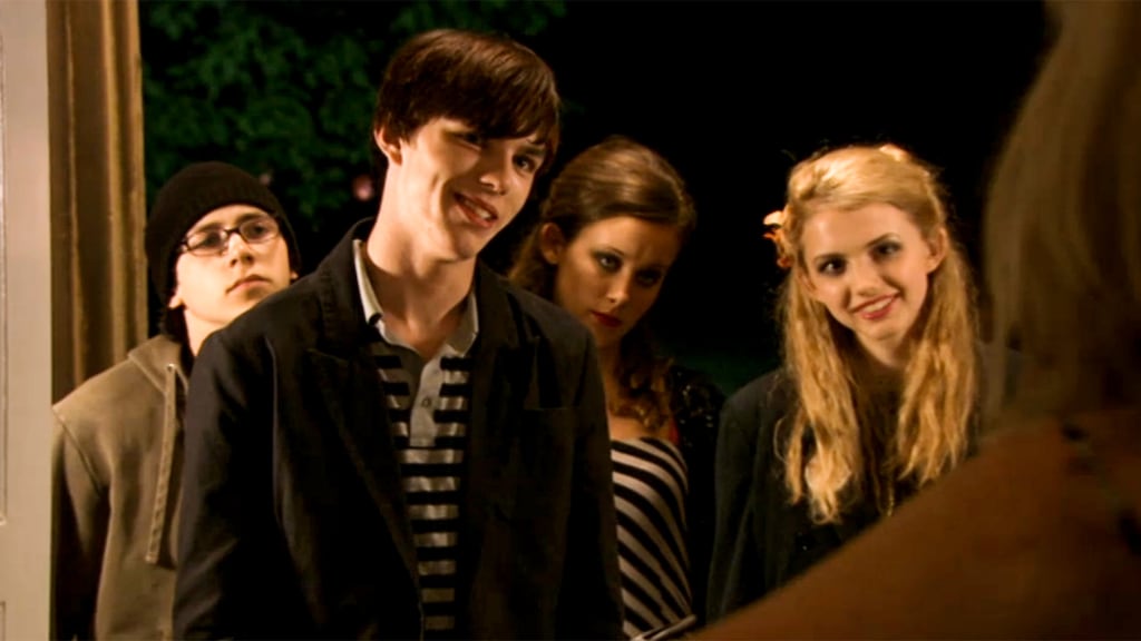 Mike Bailey, Hannah Murray posing for the camera