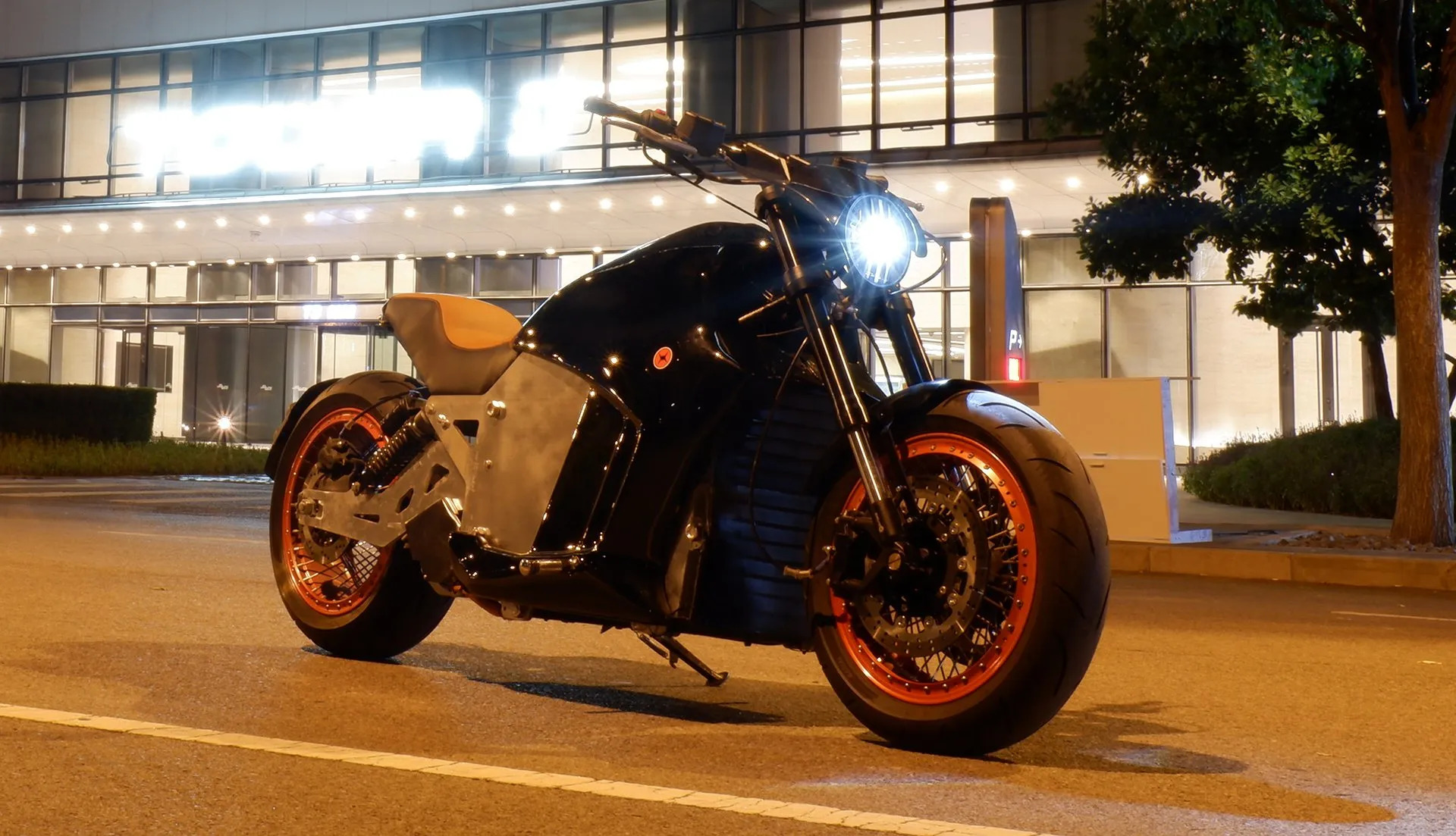 A motorcycle parked on the side of a building