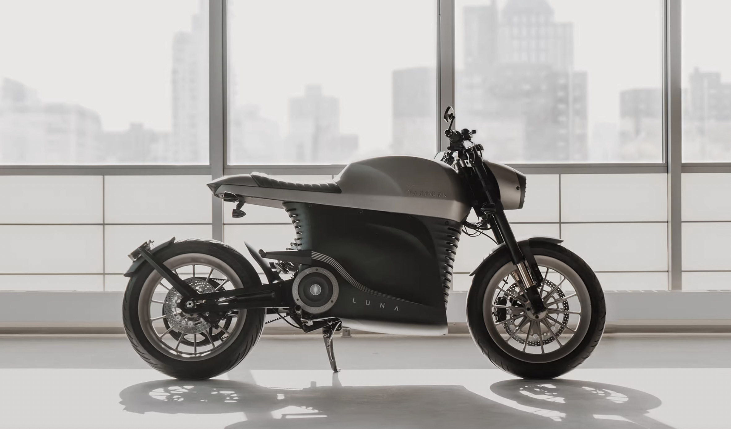 A motorcycle parked in front of a window