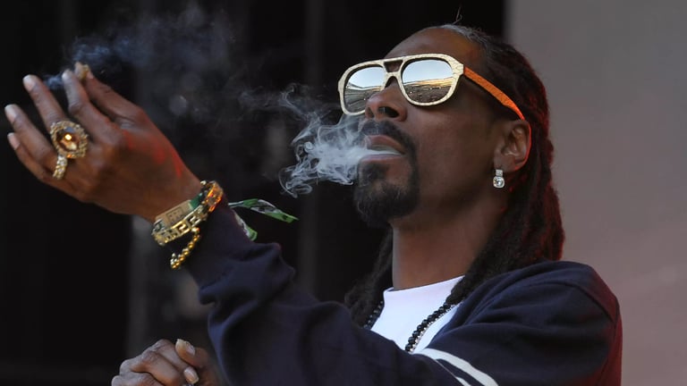 Snoop Dogg’s Professional Joint Roller Prepared 150 Blunts A Day