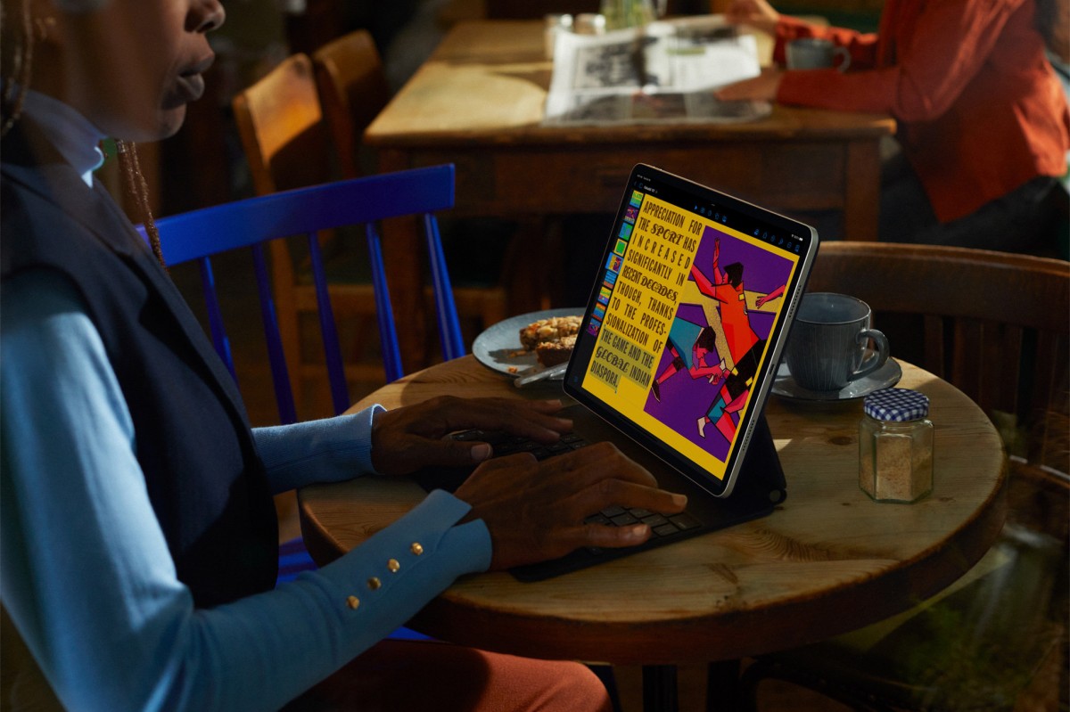 The new Apple iPad Pro with M2 being used in a cafe.