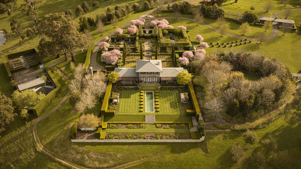 A castle on top of a grass covered field