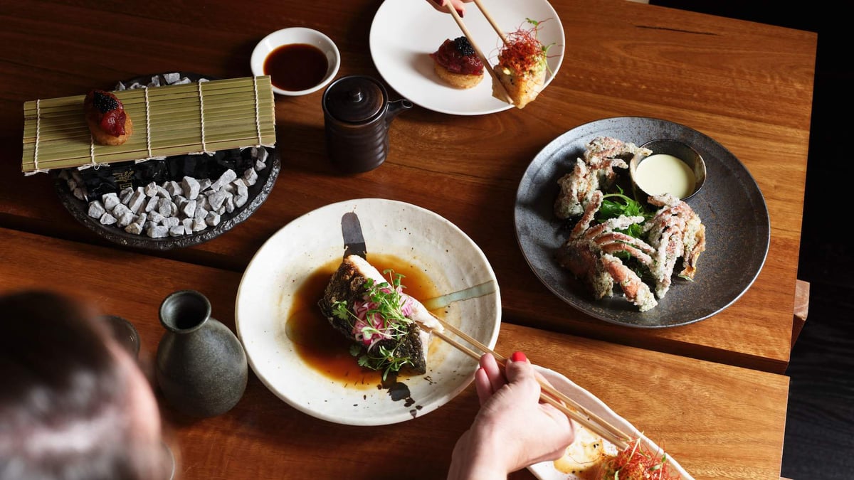 A plate of food sitting on top of a wooden table