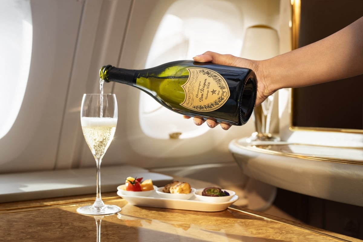 Dom Perignon being poured in First Class onboard Emirates.