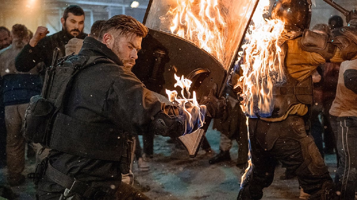 ‘Extraction 2’ Features A Brutal 21-Minute Fight Scene That Actually Set Chris Hemsworth On Fire