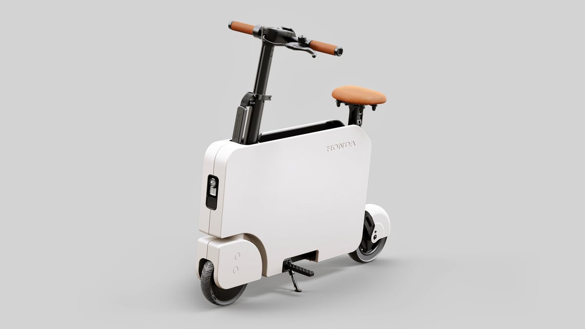 Honda’s Electric Motocompo Mini-Scooter Is Peak Airport Dad