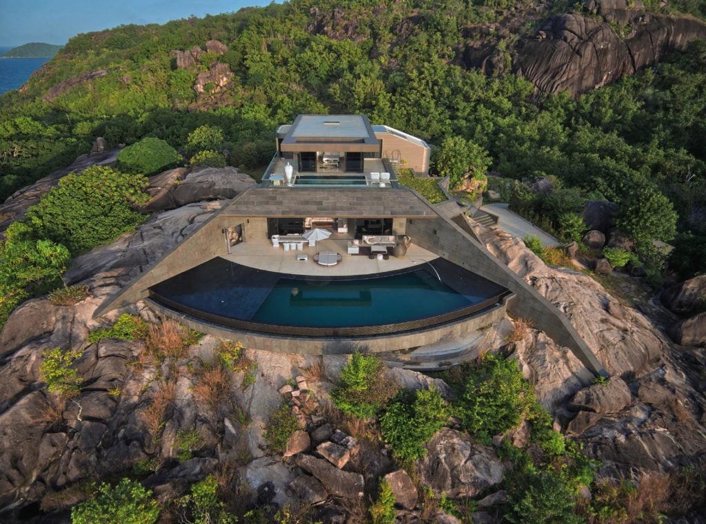 An island in the middle of a rocky mountain