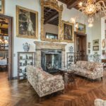 A living room filled with furniture and a fire place