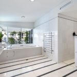 A kitchen with a sink and a window