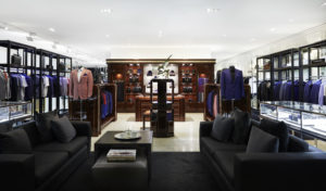 A living room filled with furniture and a large window