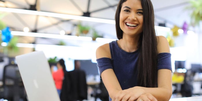 A woman smiling for the camera