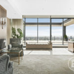 A living room filled with furniture and a large window