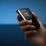 A hand holding a cellphone