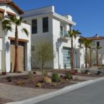 A close up of a street in front of a house