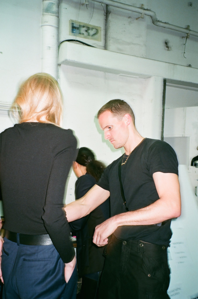 A man and a woman standing in a room