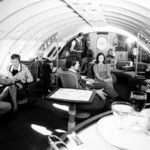 A group of people sitting at a table