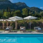 A pool with a mountain in the background