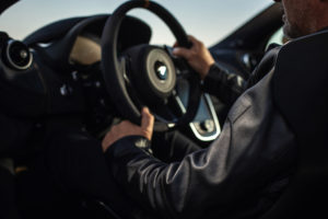 A man driving a car