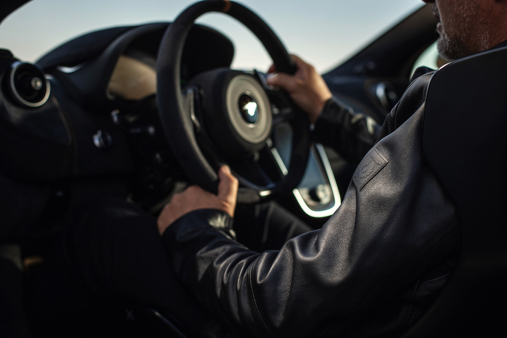 A man driving a car