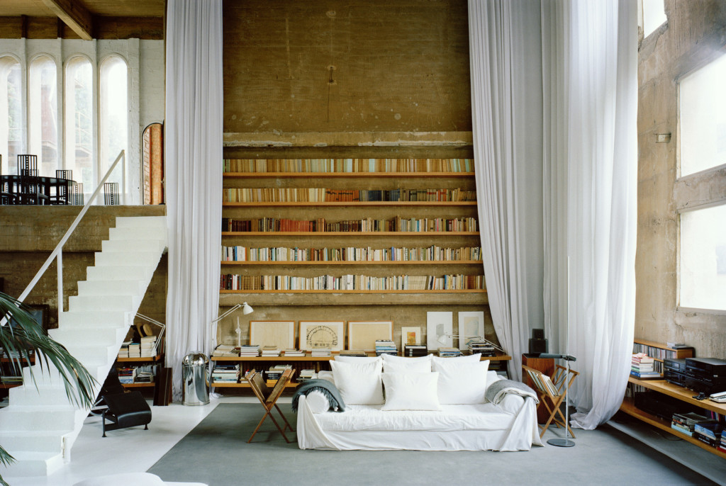 A bedroom with a large window