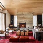 A living room filled with furniture and a fire place