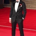 A person wearing a suit and tie
