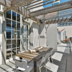 A dining room table in front of a building