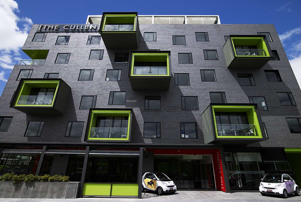 A car parked in front of a building