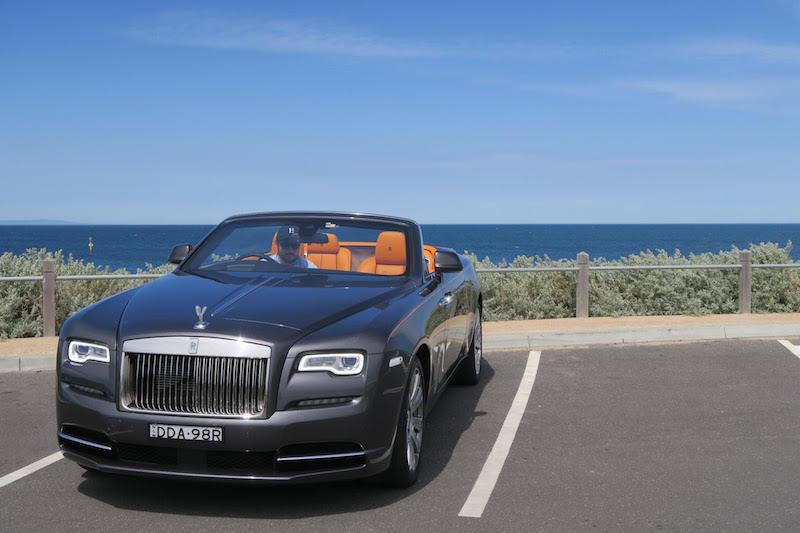 A car parked on the side of a road